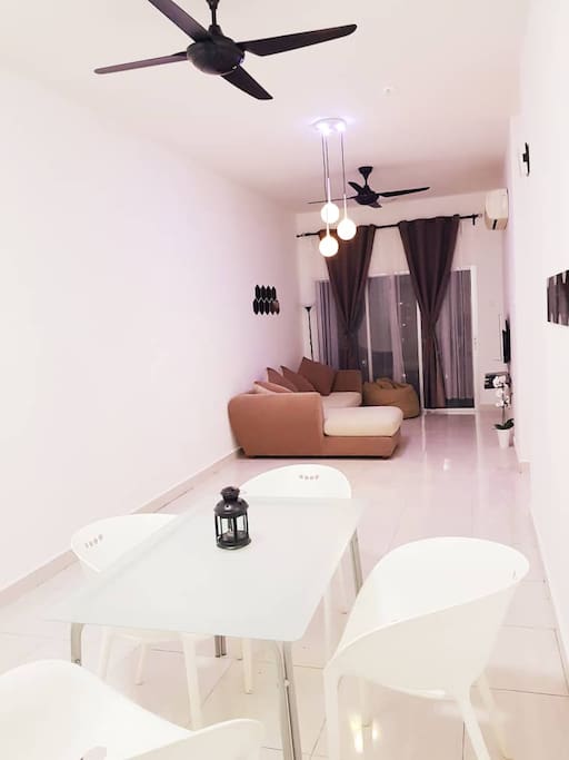 A perfect spacious living room to hangout with breezy wind by the balcony!