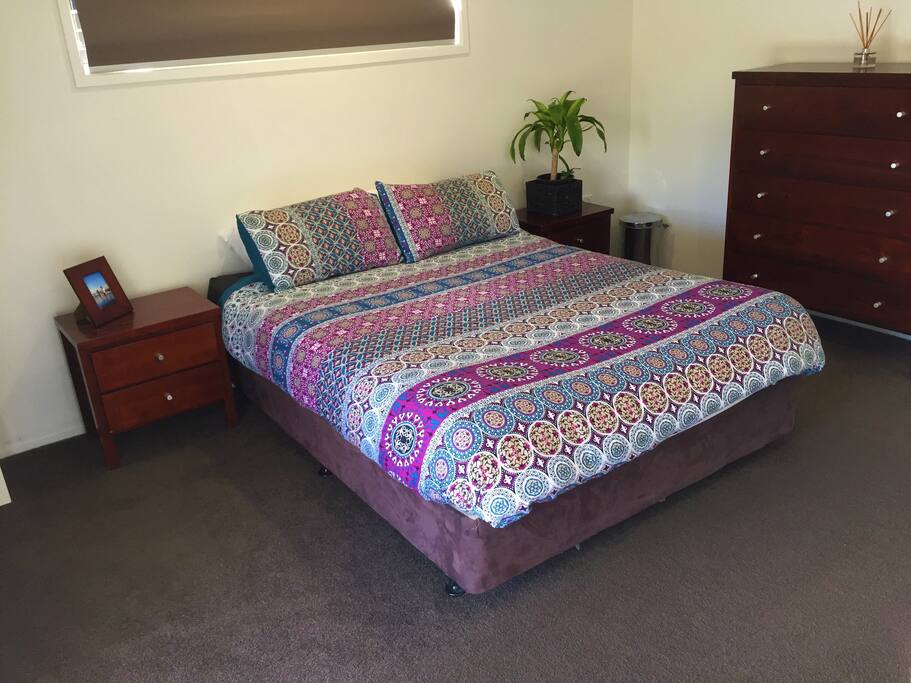 Bedroom leads directly onto balcony
