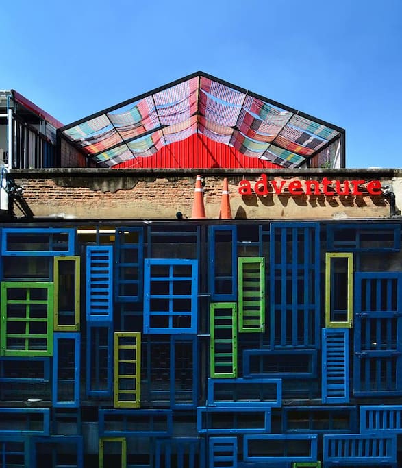 A chic design hostel with colorful facade