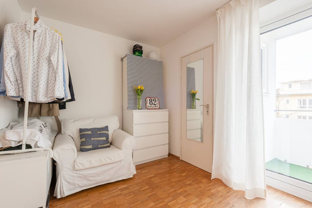 On the right is the entrance to the little balcony, in the middle the door to the small kitchen.