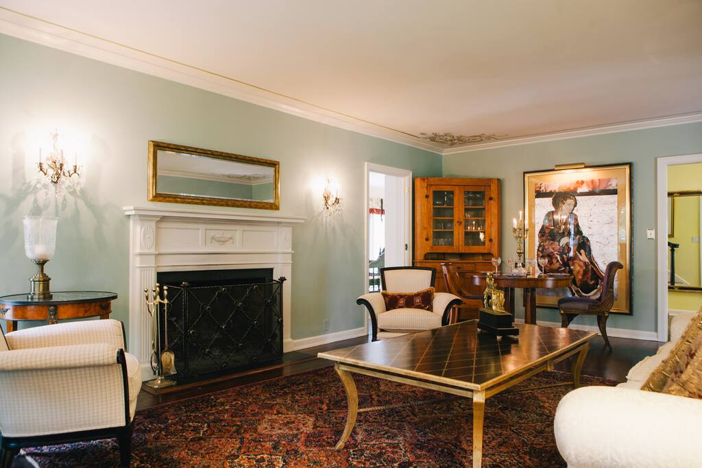 Living room with wood burning fireplace