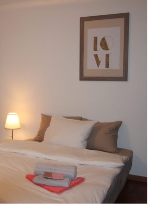 Private bedroom with access to the balcony and garden view