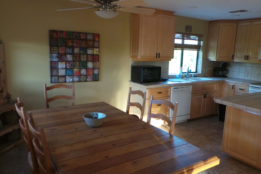 step into a large open area dining, kitchen and living area