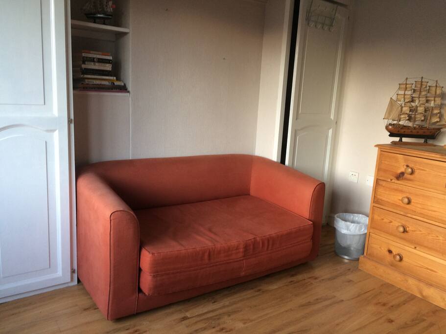 sofa bed in single room