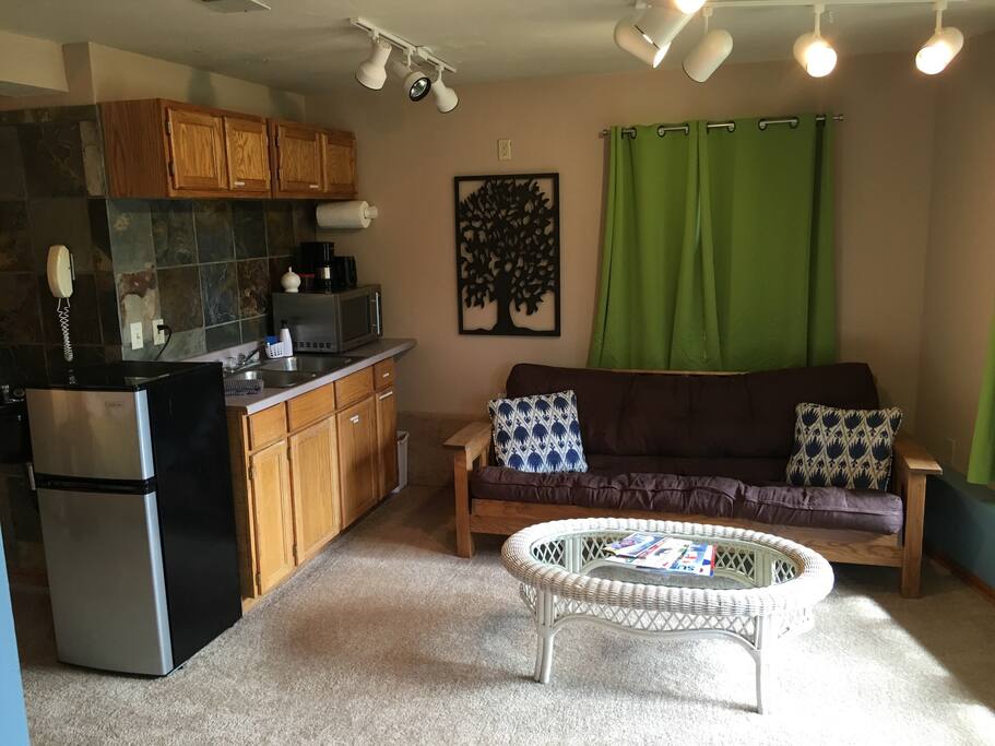 Kitchenette with coffee and a comfortable sitting area. Futon is great for lounging or having extra guests.