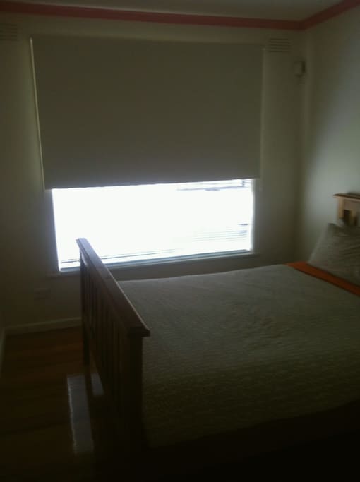 Room with blinds and a black out blind.