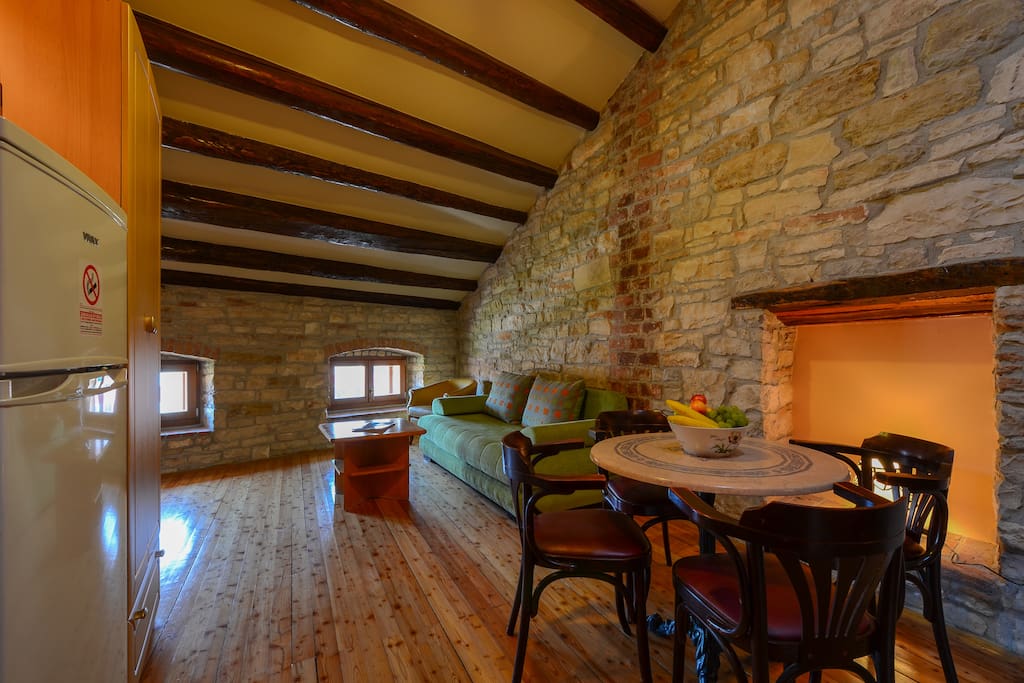 Living room in traditional Istrian style dominated by stone