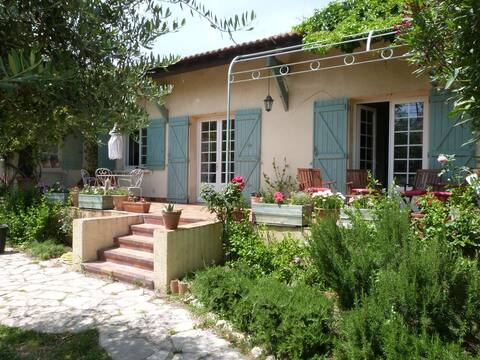 Family home in the heart of a wooded village. Swimming pool