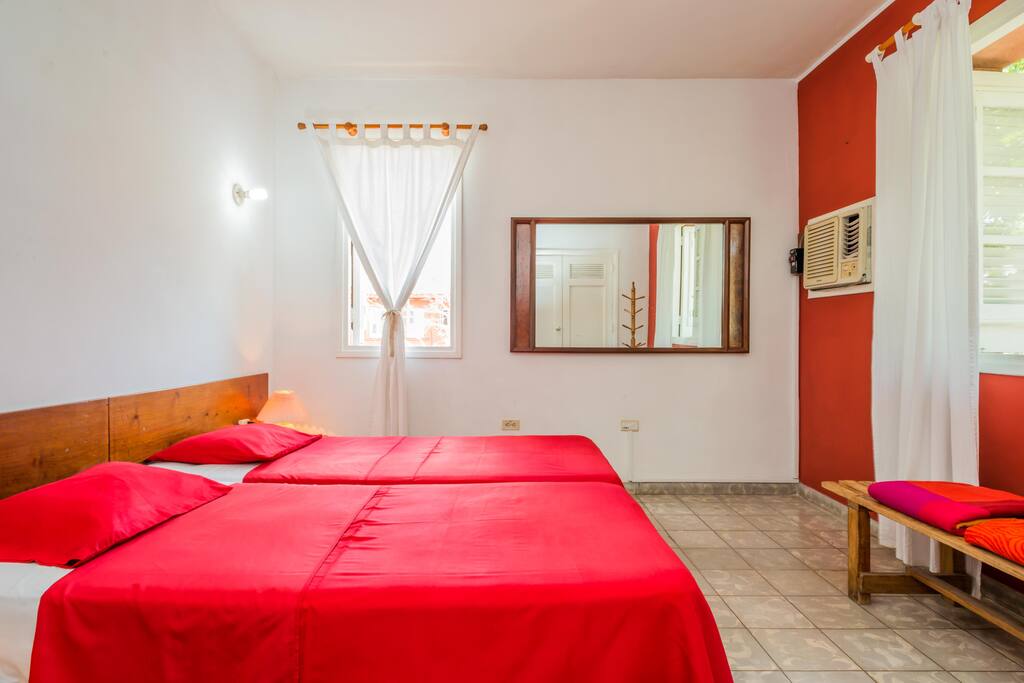 Comfortable bed for a deep sleep, with air conditioning and overlooking the city.