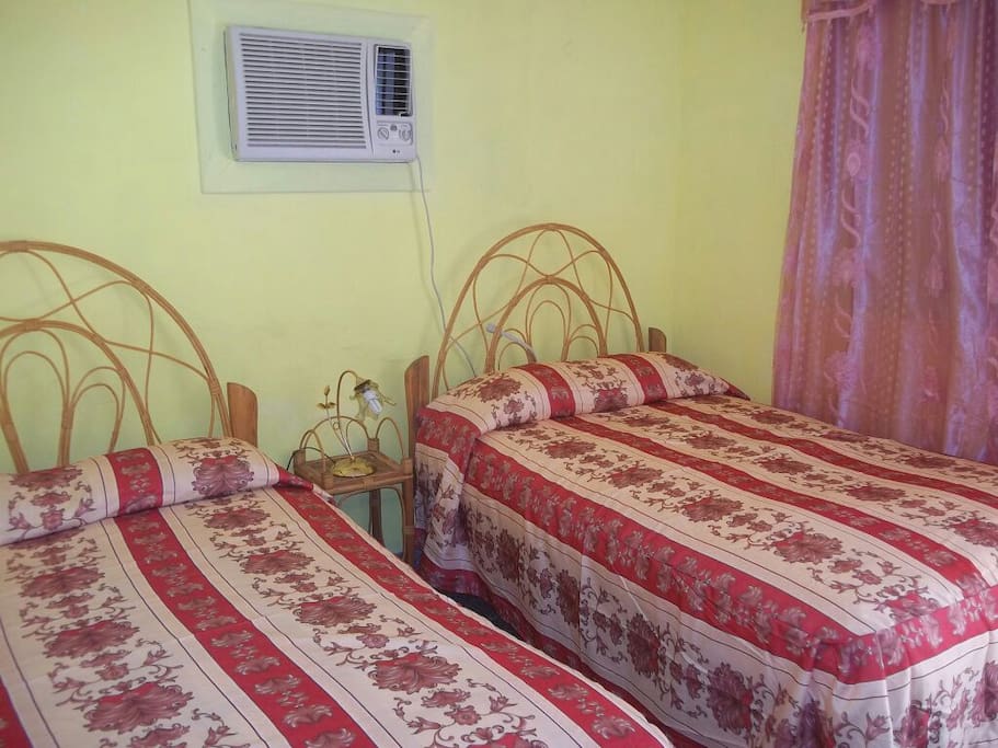 Room 2 with direct entry to the garden and seperate bathroom