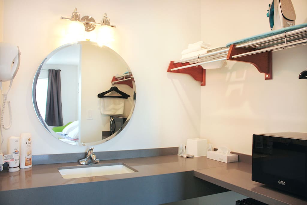 Sink Area w/ Hairdryer, Microwave, Fridge, Strorage