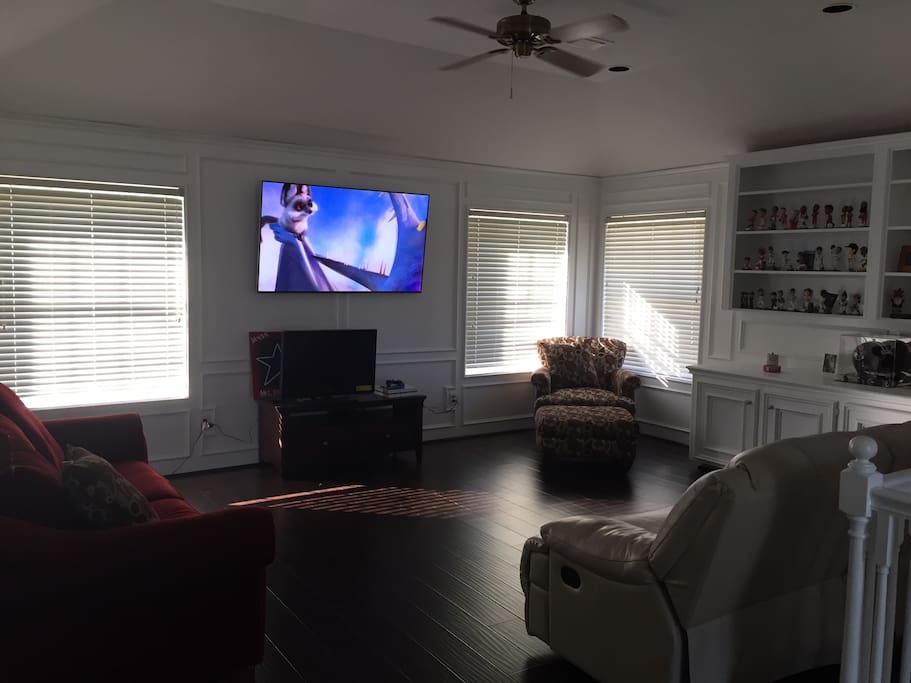 Relax in the upstairs game room. Two recliners and a pull out sofa bed for extra room!
