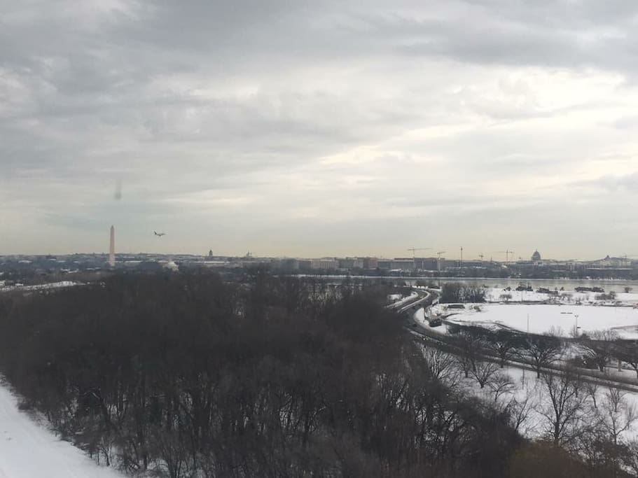 Even if the weather turns, the view is still gorgeous and you're close enough to walk to National and catch your flight. (Don't worry! Triple pane glass keeps the apartment super quiet!)