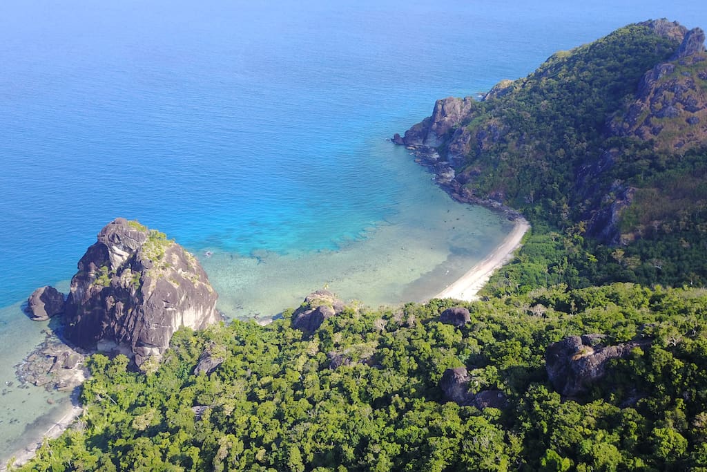 We can go by boat to this secluded spot for a picnic!