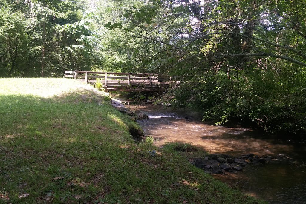 Yellow Creek, after a storm, and the bridge to the cottage.