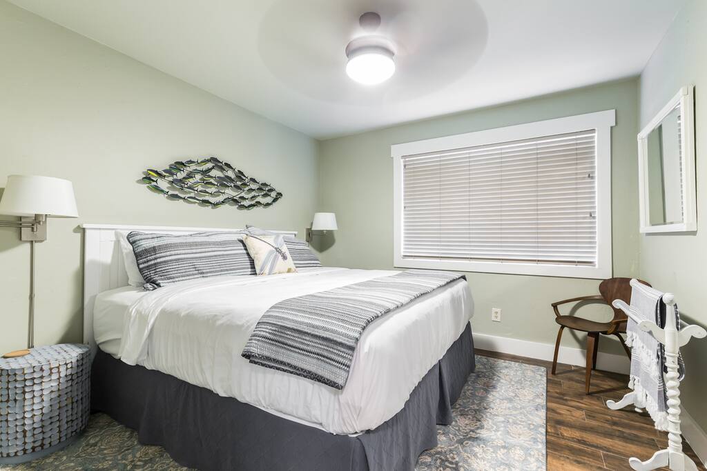 Front bedroom with King bed, pillow-top mattress, and luxury linens.