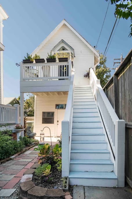 Carriage house has a private entrance and is accessed via the staircase shown in the photo.