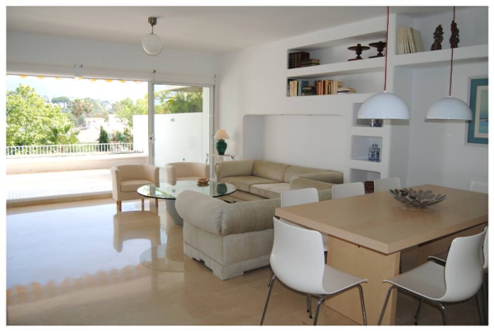 Spacious lounge with air conditioning and tv