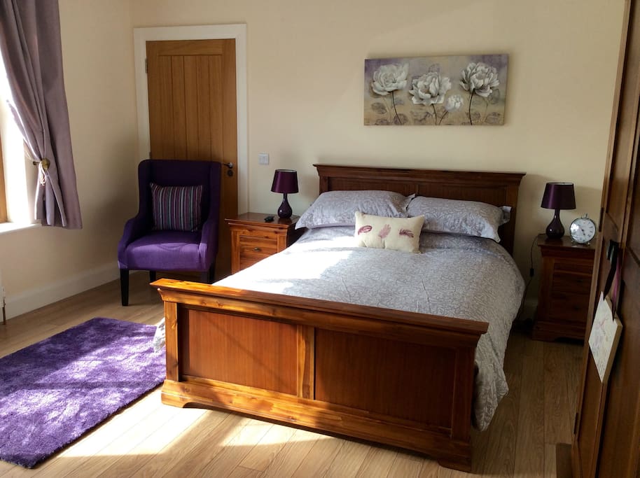 Fresh comfy bedroom with double bed