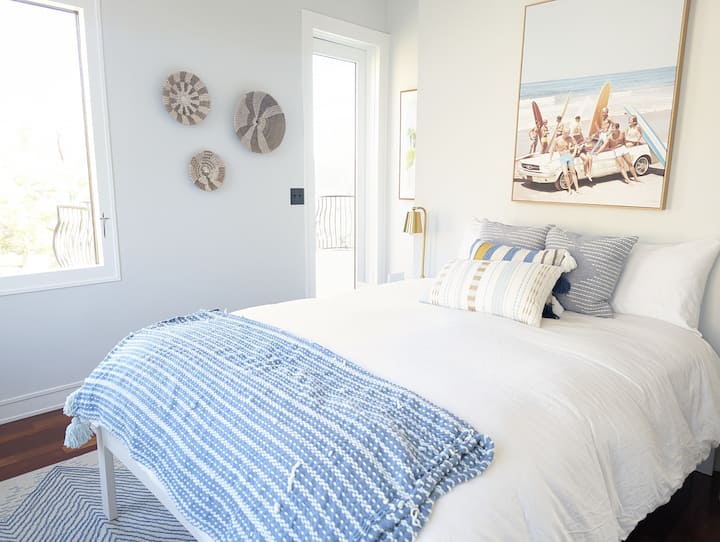 Bedroom 2 with door to the patio overlooking the hills