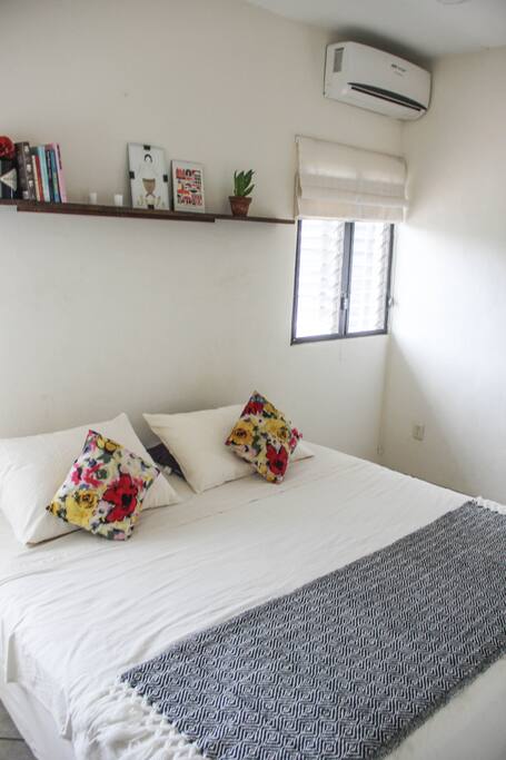 Private room with AC, fan and closet.