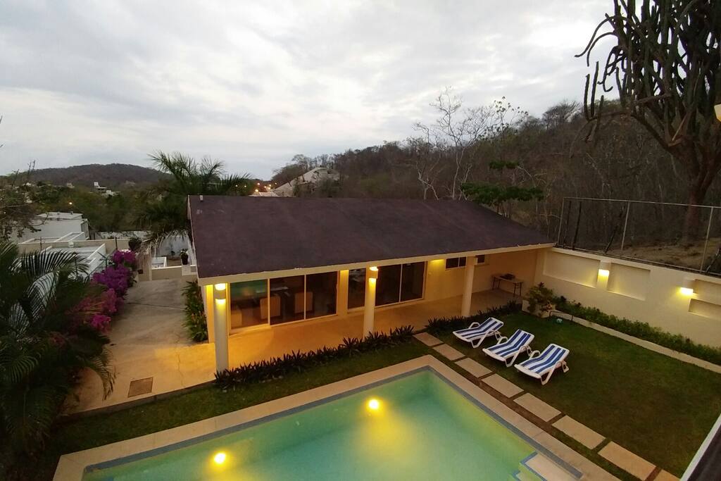 Look of the pool area from above, Lounge chairs are ready for you.