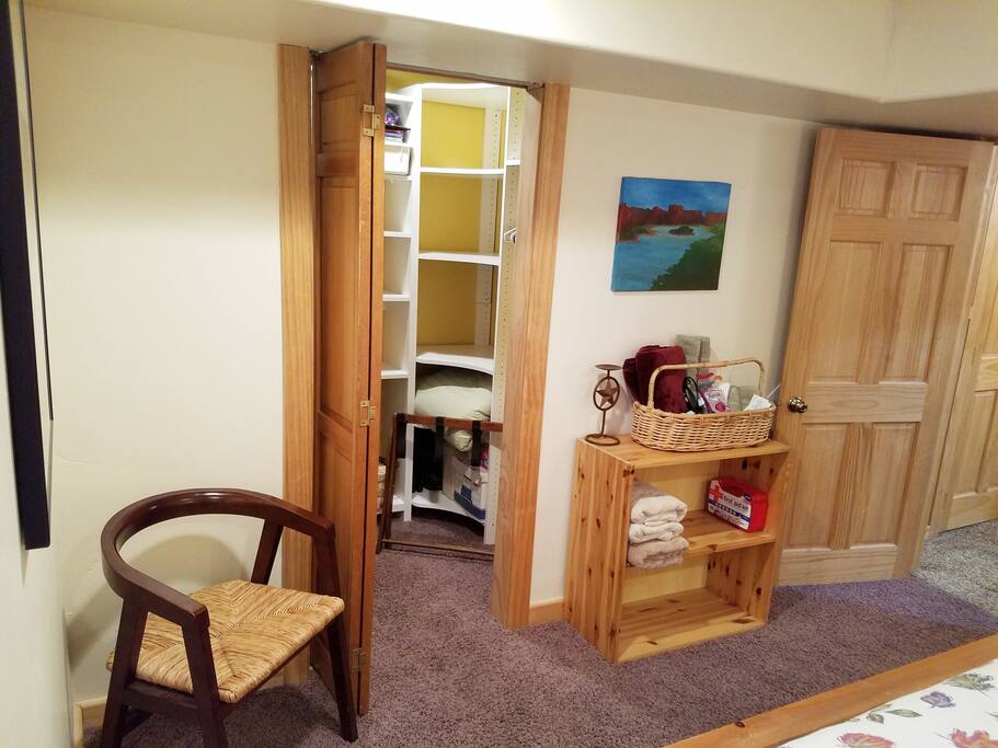 Closet and cubbies for your stuff, basket of essentials