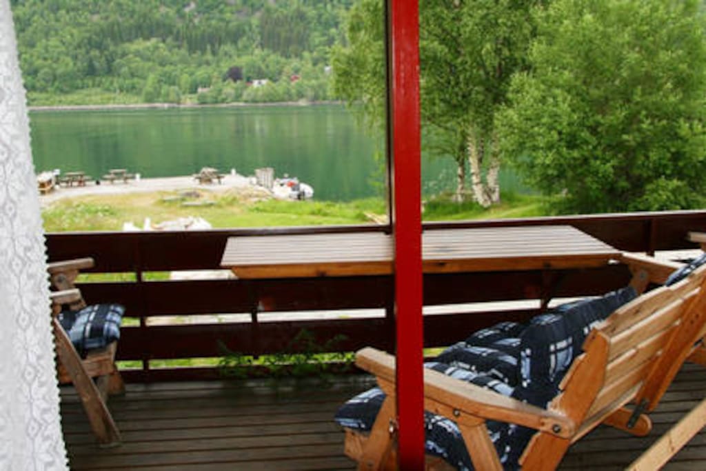The cabin has a nice porch with furniture, where you can enjoy the view