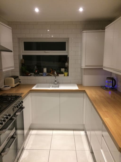 Fully equipped kitchen with gas range,walk in larder, microwave, fridge freezer and washing machine...