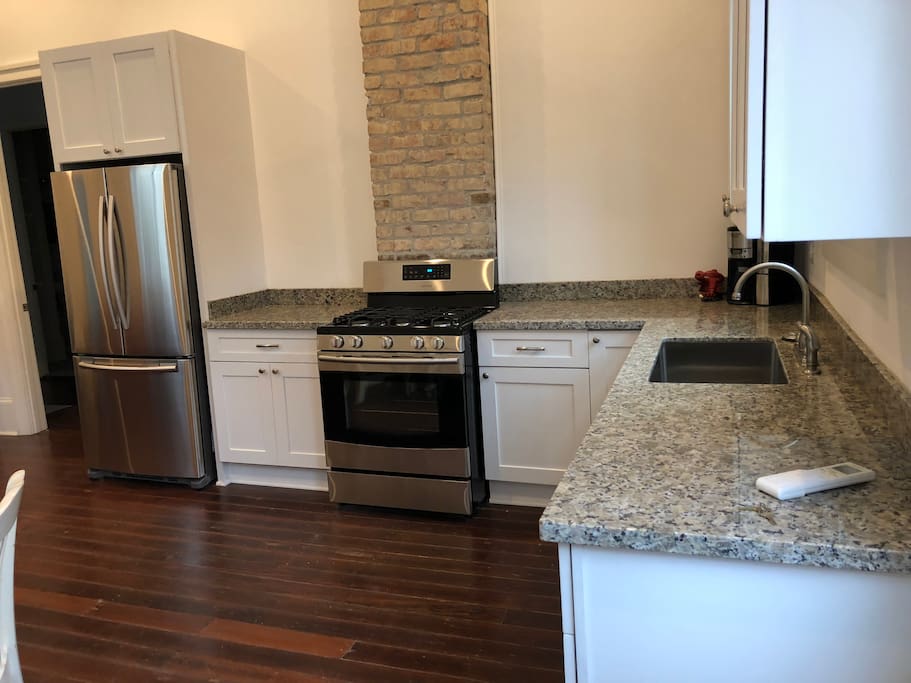 Open concept fully stocked kitchen for eating in if you like (Whole Foods is just down the street).