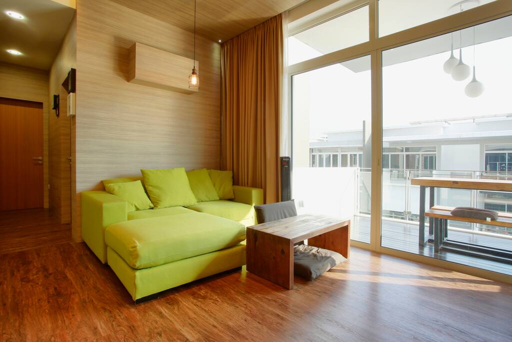 Spacious high ceiling and comfy living room.