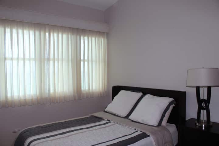 Queen size Bed First Bedroom