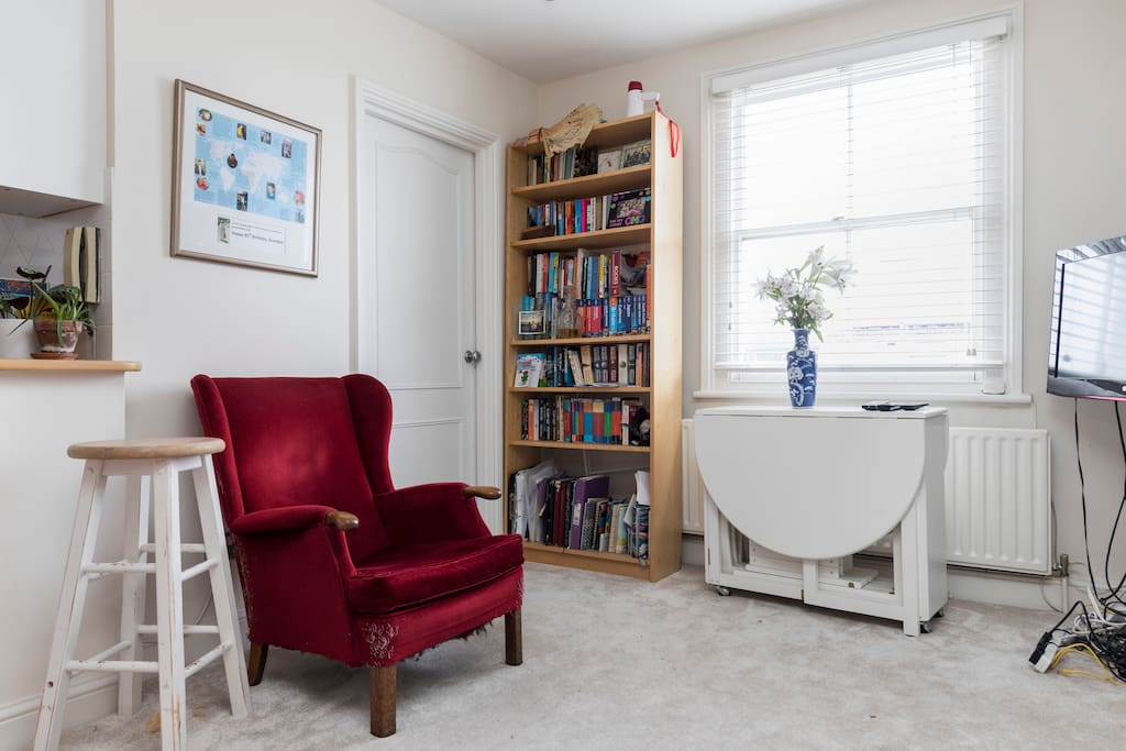 TV, DVD player and wifi. The white side table converts into a table and chairs for 4 people. Board games and books for people fancying a quiet night in.