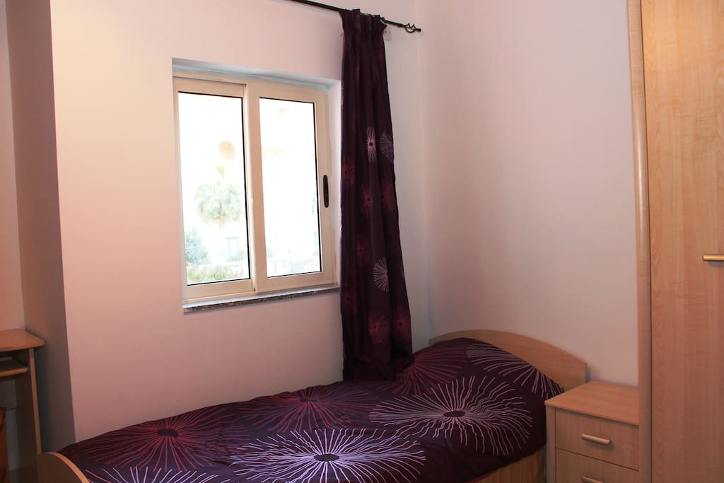 Private Room with single beds (1 or 2), desk and wardrobe.