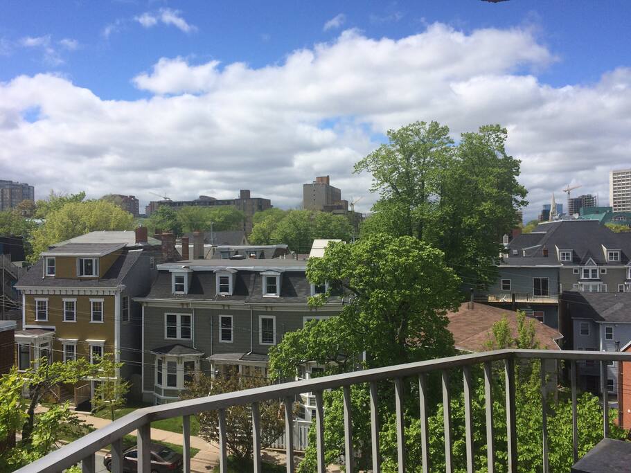 Balcony with table chairs and bbq!