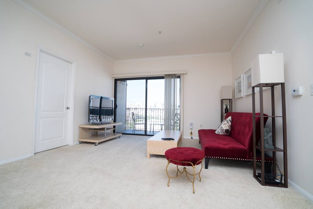 Bright and sunny living room and 50inches TV plasma with Netflix