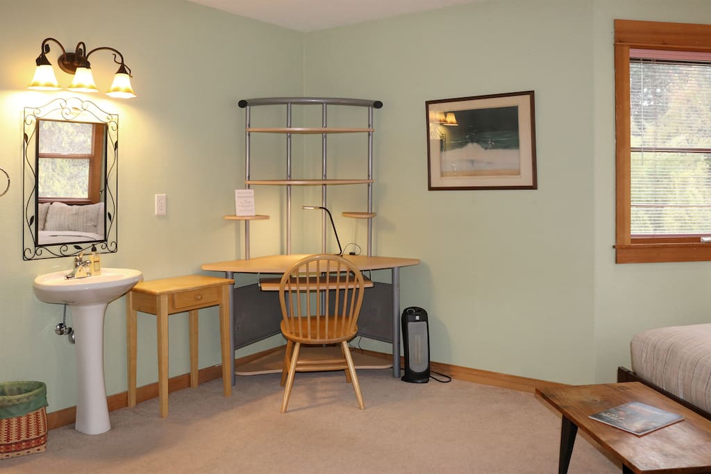 Desk and pedestal sink. Very spacious and light.