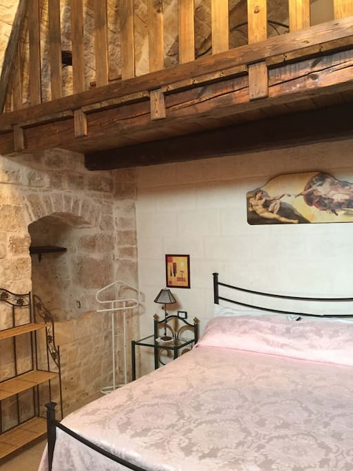 Camera quadrupla composta da letto matrimoniale e 2 letti singoli con bagno privato