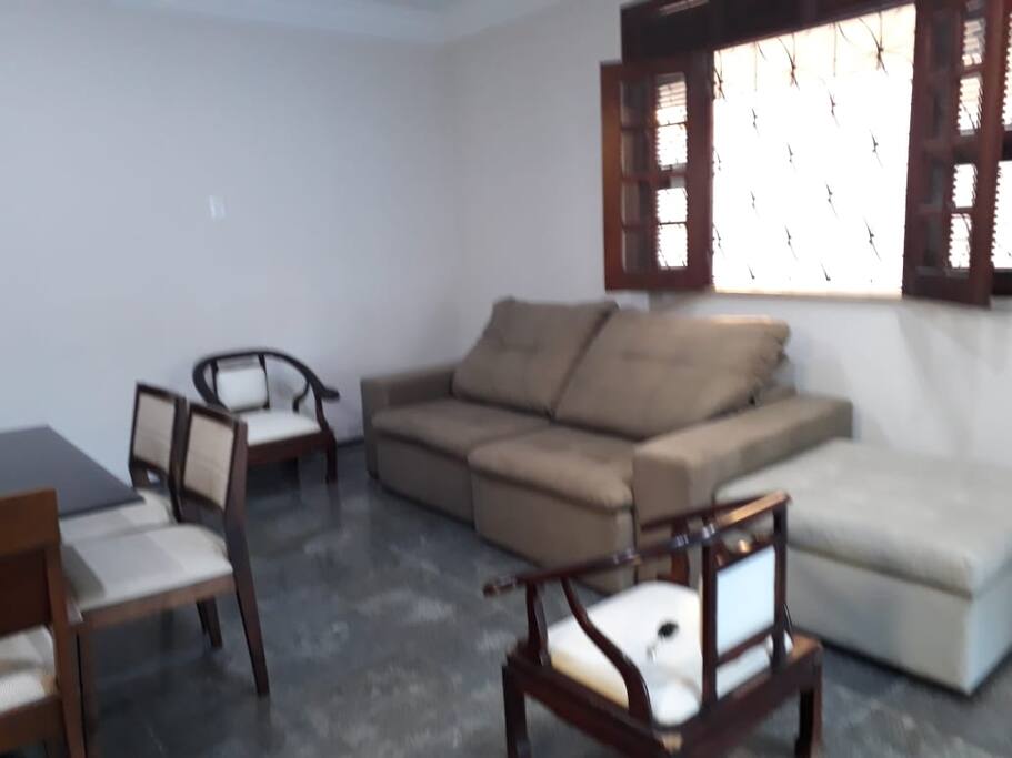 Sala com sofá-cama