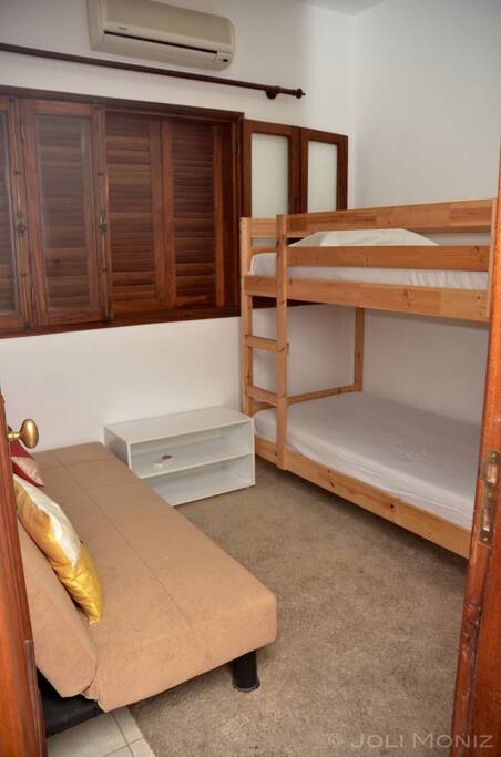 Bunk-bed and sofa bed in the guest room.