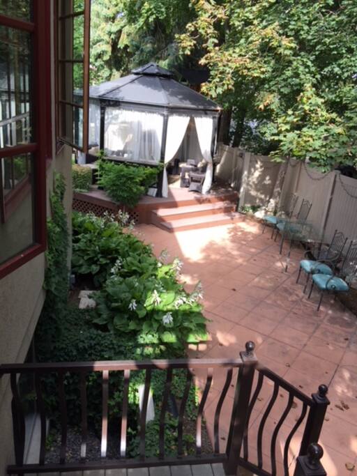 The gazebo with comfortable couches to relax, read or meditate.