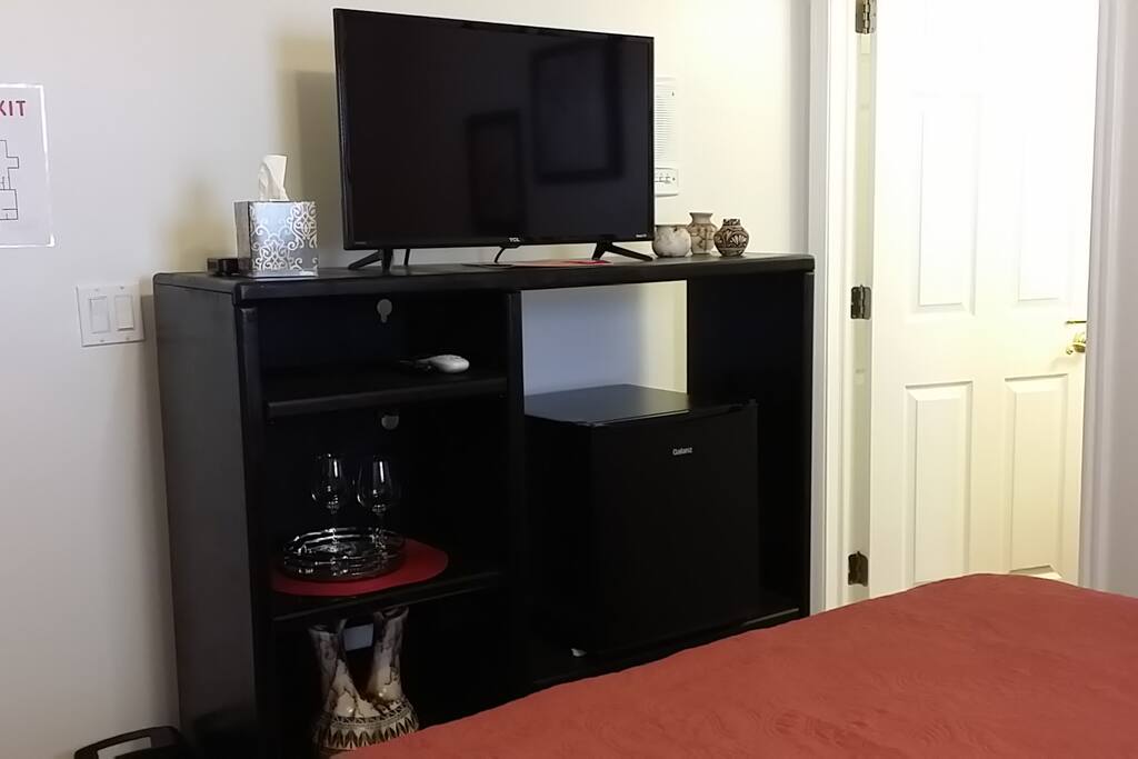Flat screen tv and refrigerator