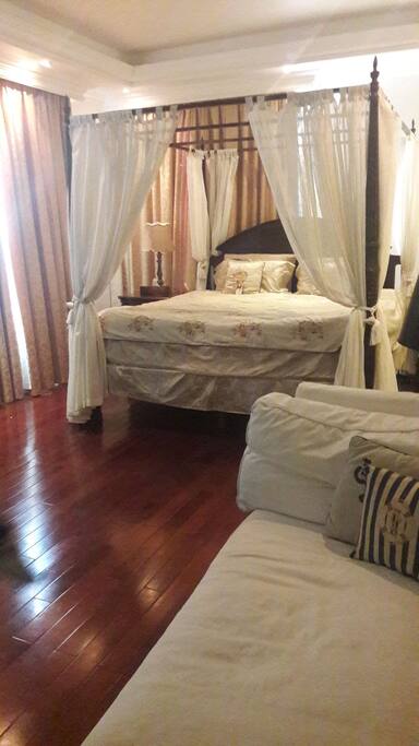 The Master Bedroom with 4 poster king bed