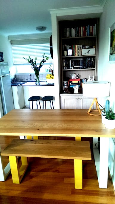 Start your day basked in sunlight while eating/reading at this dining room table.