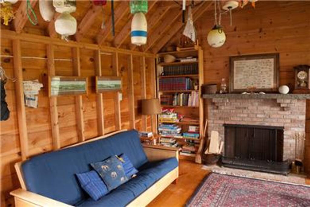 Family room with working fireplace-a place where kids can play.