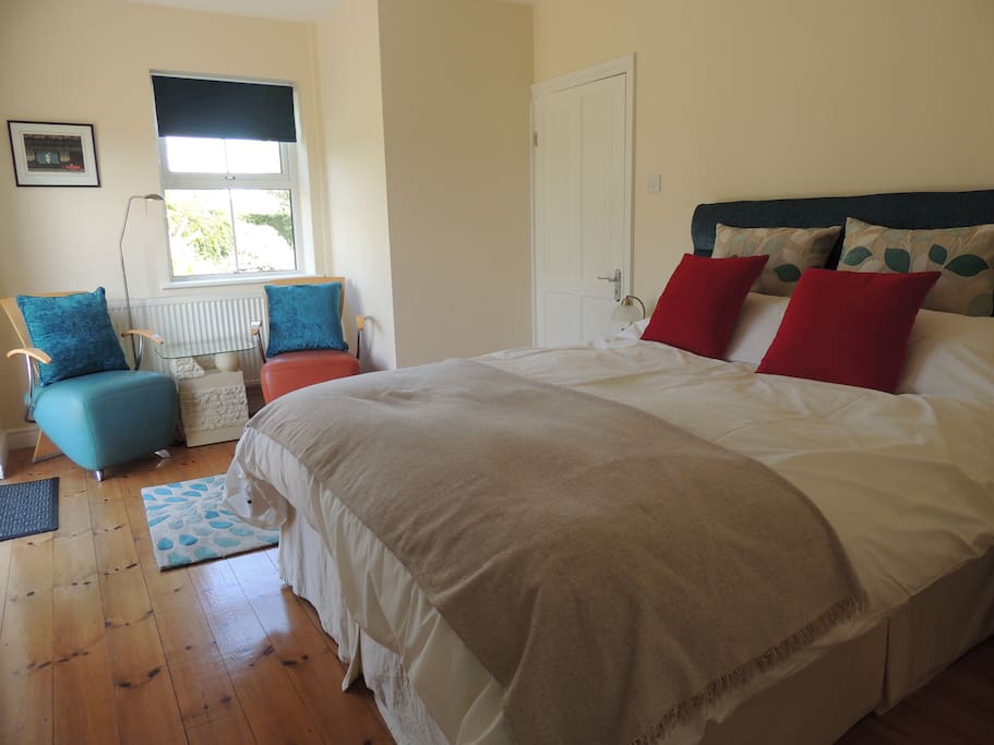 The Meadow Bedroom. Kingsize bed. A gorgeous sunny room. French doors open onto a private patio area.