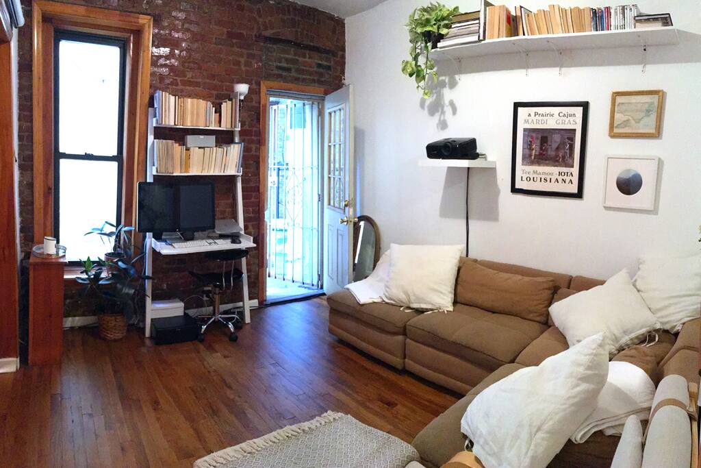 Living room with door leading to the private garden