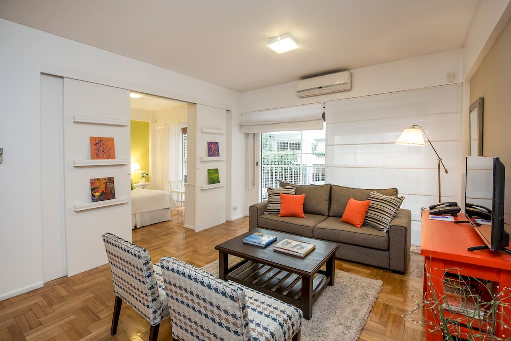 Living room. Sliding doors to balcony.