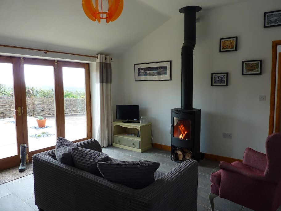 Bi-fold doors and log burner.
