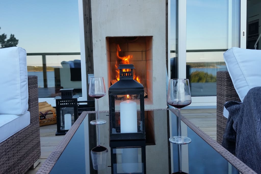 Relax in front of outdoor fireplace
